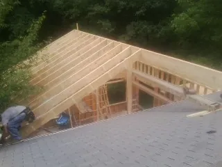 Framing a new roof addition that ties into an existing shingle roof in New Trenton